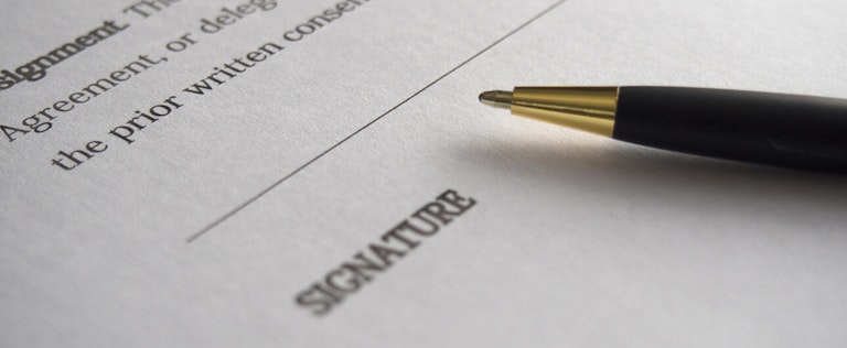 Legal document signature with pen