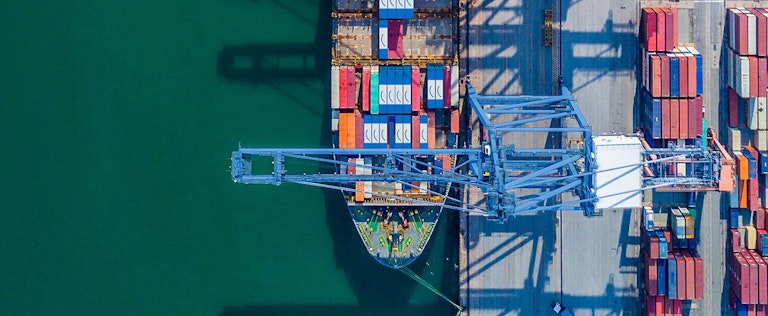 top view of Move Happy cargo containers on a ship at port