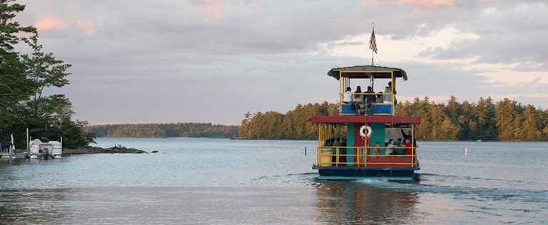 ferry on the water by Point Sebago