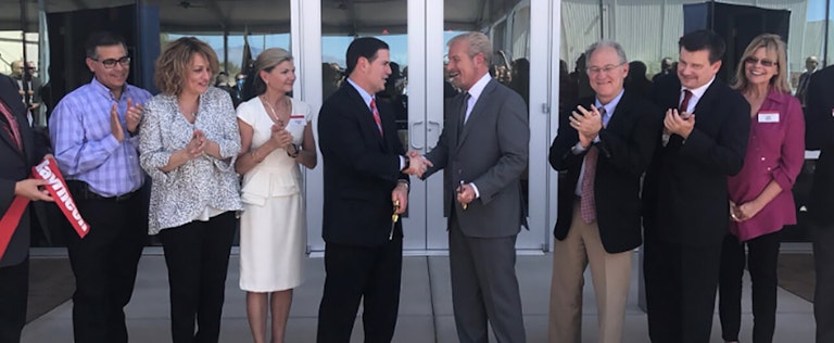 Shaking hands at opening ceremony event